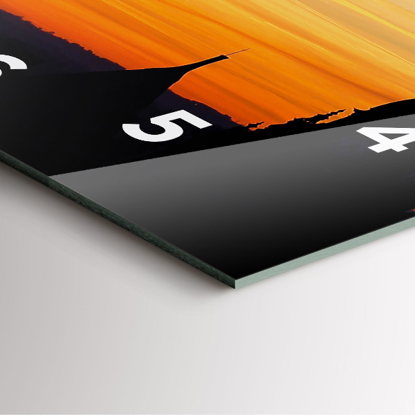 Reloj cuadrado Edificio y puesta de sol