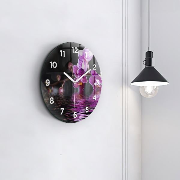 Reloj de cristal redondo Flor de orquídea sobre el agua