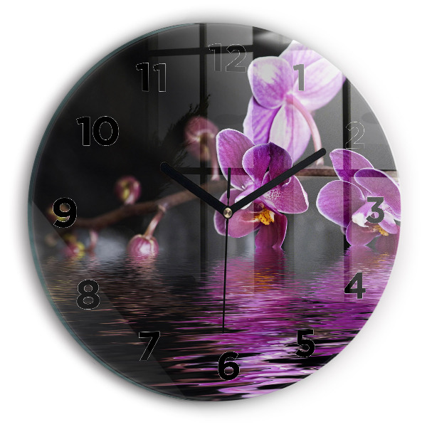 Reloj de cristal redondo Flor de orquídea sobre el agua