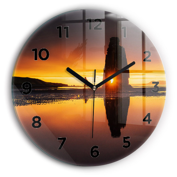 Reloj de cristal redondo Corredor y puesta de sol