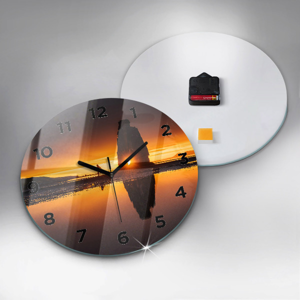 Reloj de cristal redondo Corredor y puesta de sol
