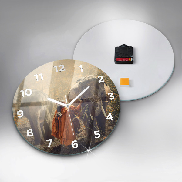 Reloj de pared redondo Monje guiando elefantes