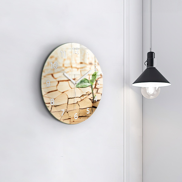 Reloj redondo pared Planta en tierra seca