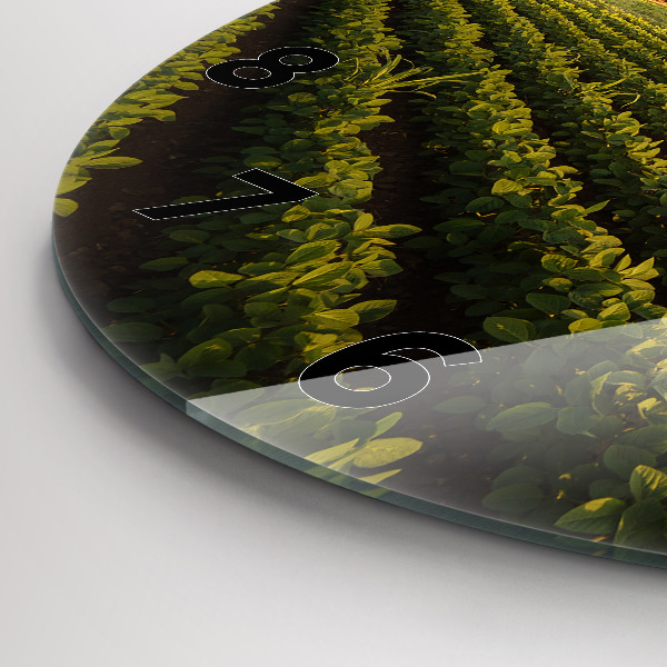 Reloj redondo pared Tractor fumigando un campo