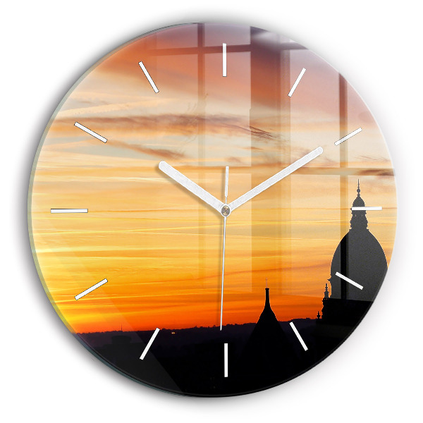 Reloj de cristal redondo Edificio y puesta de sol