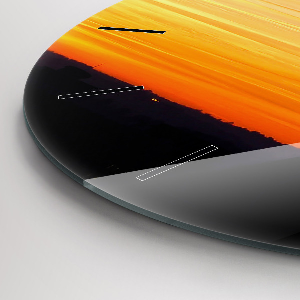 Reloj de cristal redondo Edificio y puesta de sol