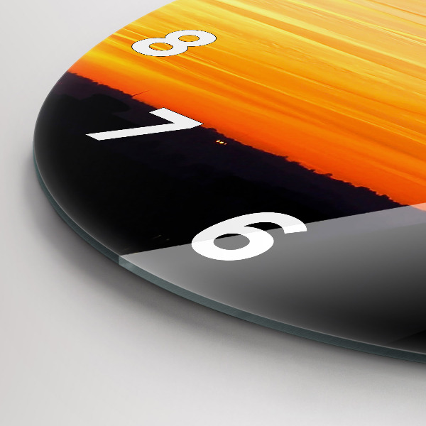 Reloj de cristal redondo Edificio y puesta de sol